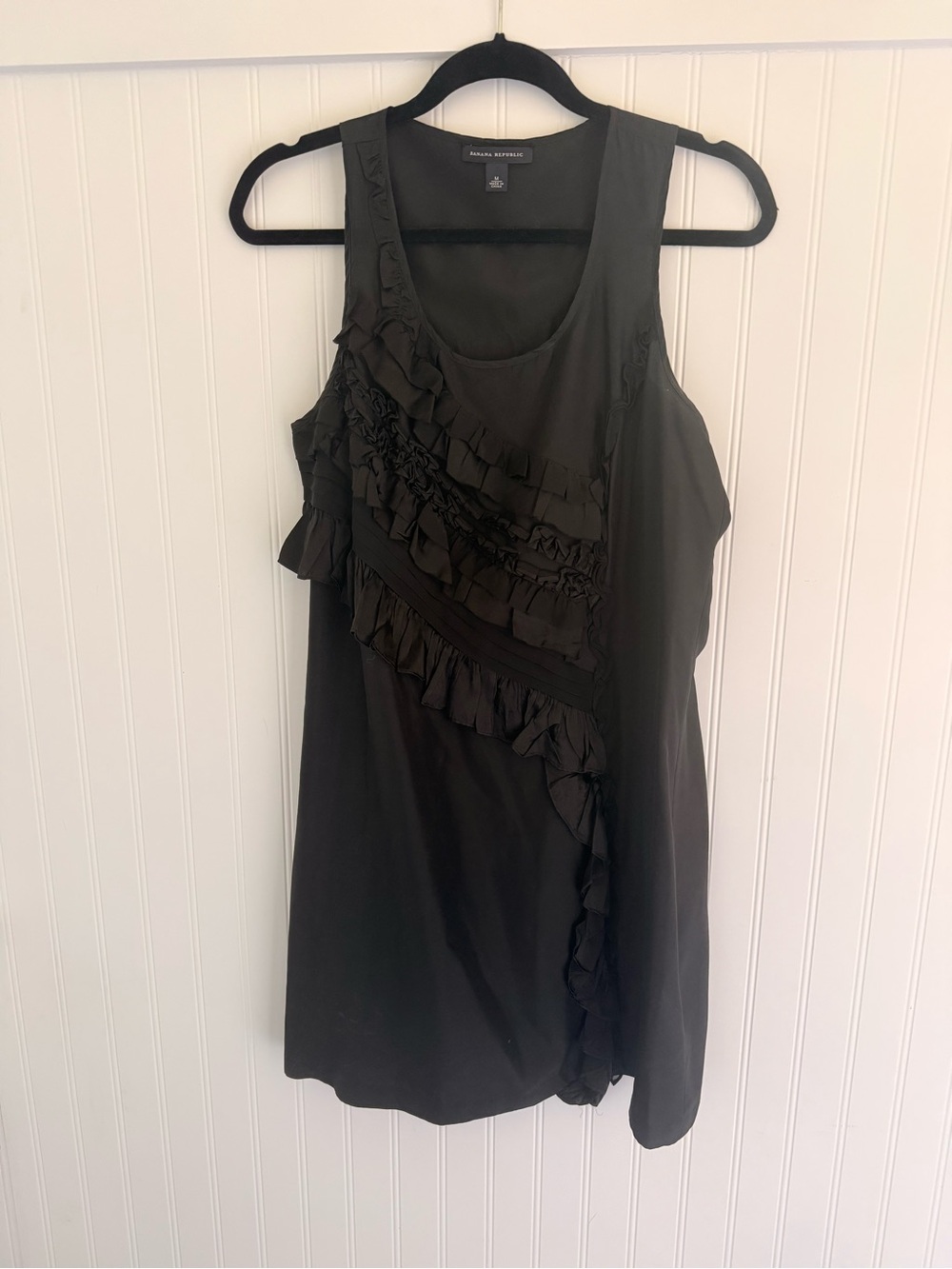 Banana Republic shift dress, black with ruffle accents. sleeveless. Size M.